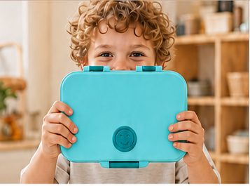 Child holding a Blue-Teal Fineyorker bento box